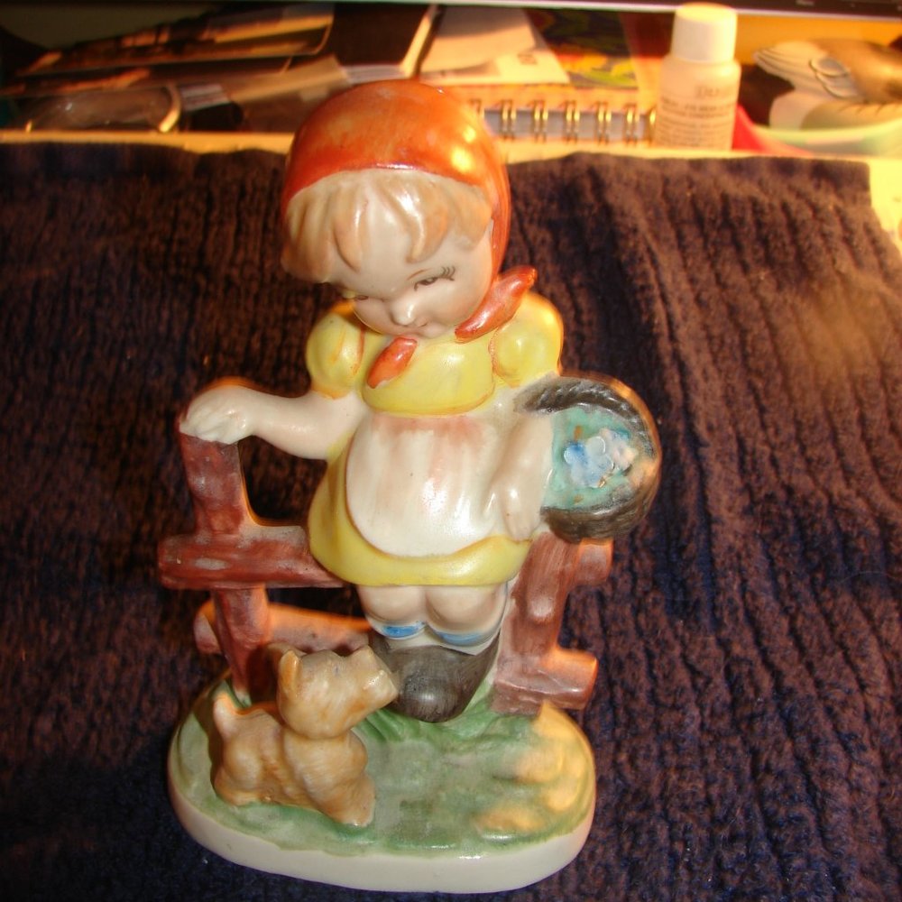 "K-12"Chalkware Girl on Fence